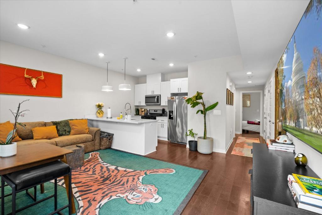 a kitchen and living room with a tiger rug at Entire DC House 2BR 2BA Fire Pit Free Parking Near Capitol Hill in Washington, D.C.