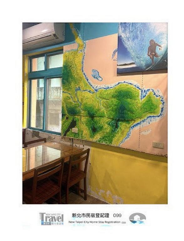 a mural of a map on the wall of a restaurant at Being Outdoor in Gongliao