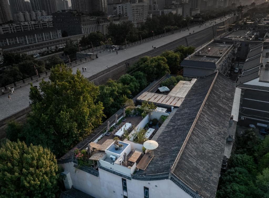 an overhead view of a house with a roof at 垣里民宿The hotel under the city wall in Xi'an