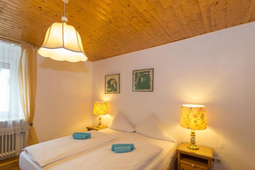 Postel nebo postele na pokoji v ubytování Hotel Moosbichl