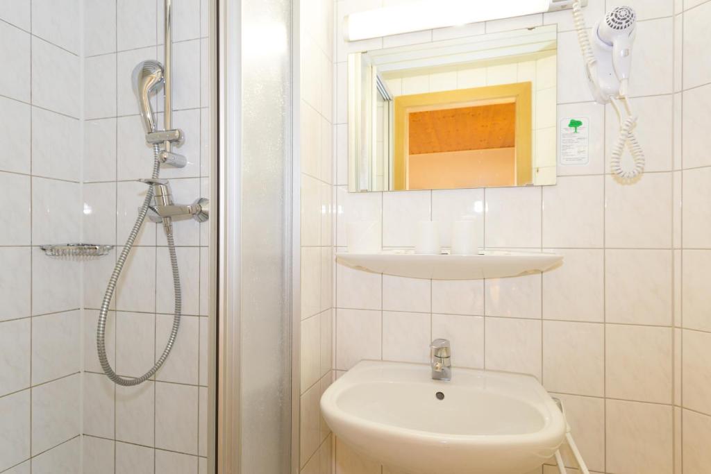 Koupelna v ubytování Hotel Moosbichl