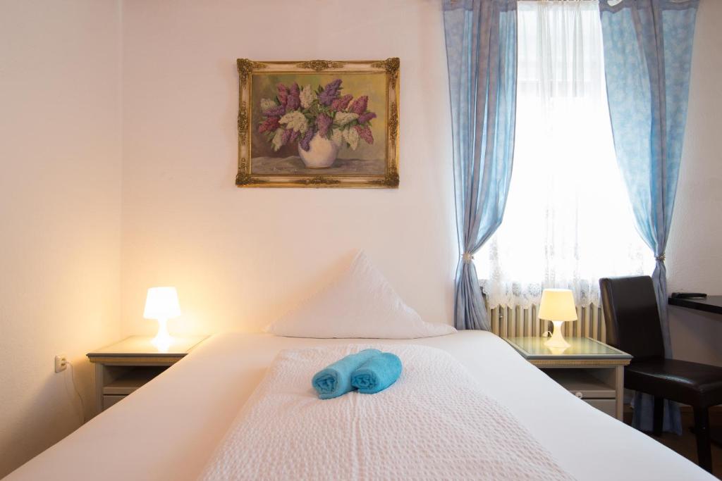 Postel nebo postele na pokoji v ubytování Hotel Moosbichl