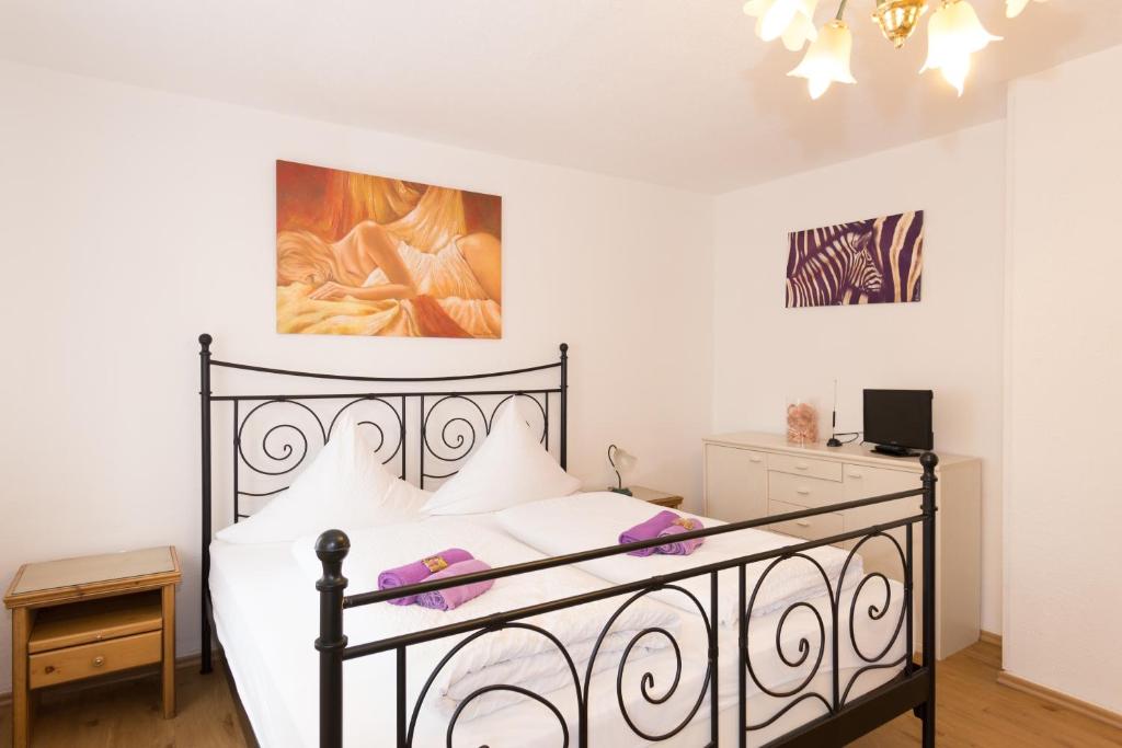 Postel nebo postele na pokoji v ubytování Hotel Moosbichl