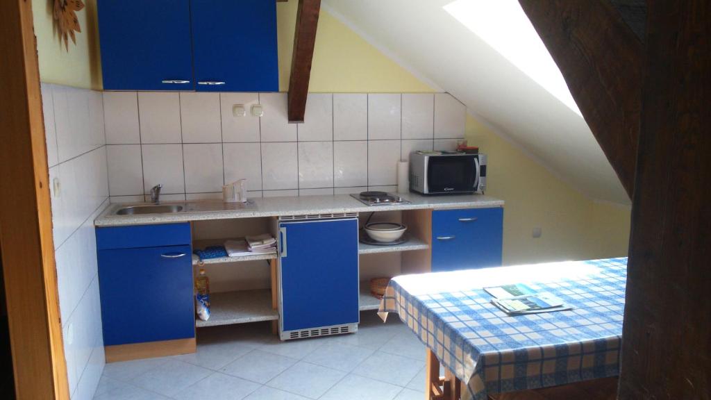 Kuchyňa alebo kuchynka v ubytovaní Apartments T&M