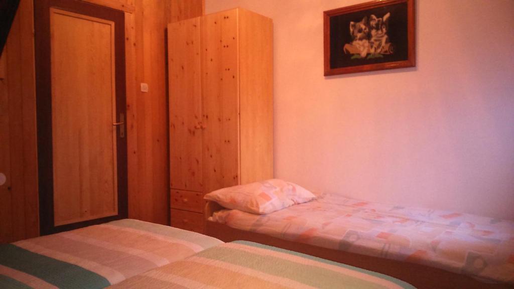 Posteľ alebo postele v izbe v ubytovaní Apartments T&M
