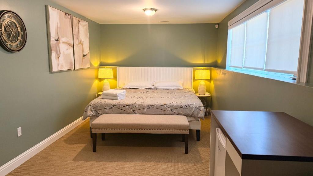 a small bedroom with a bed and a window at Private King Bed Room Near UPEI & Downtown Cozy Retreat Near Everything in Charlottetown