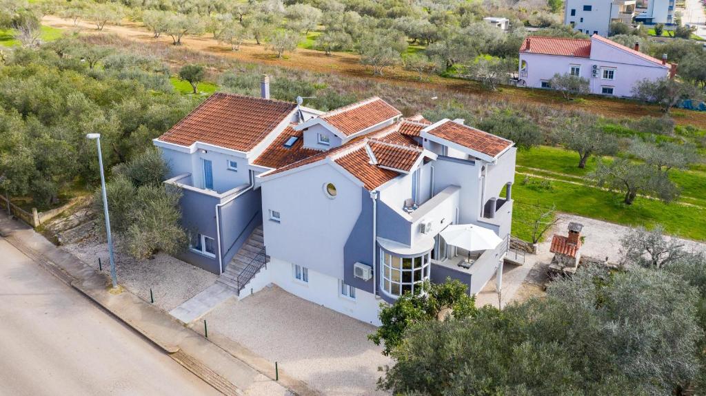 an aerial view of a house with at Villa Mirena in Kožino