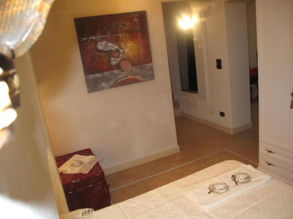A bed or beds in a room at Marilyn