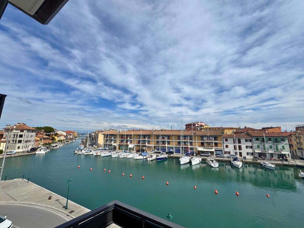 a view of a harbor with boats in the water at Riviera Appartament in Grado