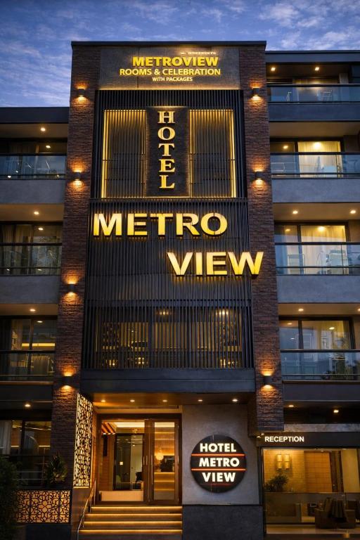 a metro view sign on the front of a building at HoTEL METRoVIEW in Bahādurgarh