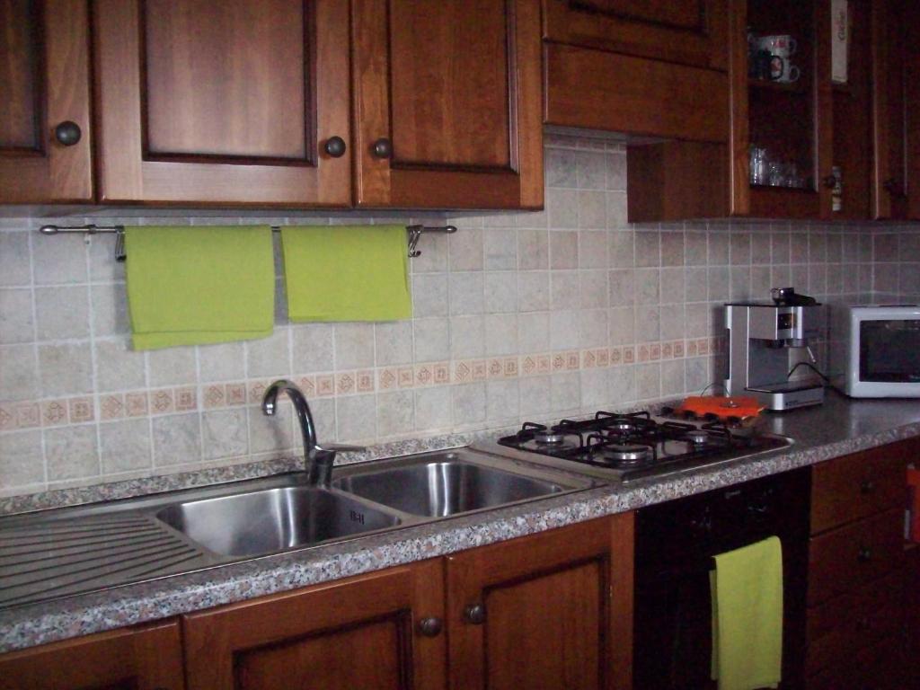Kuchyň nebo kuchyňský kout v ubytování B&B Kazakova