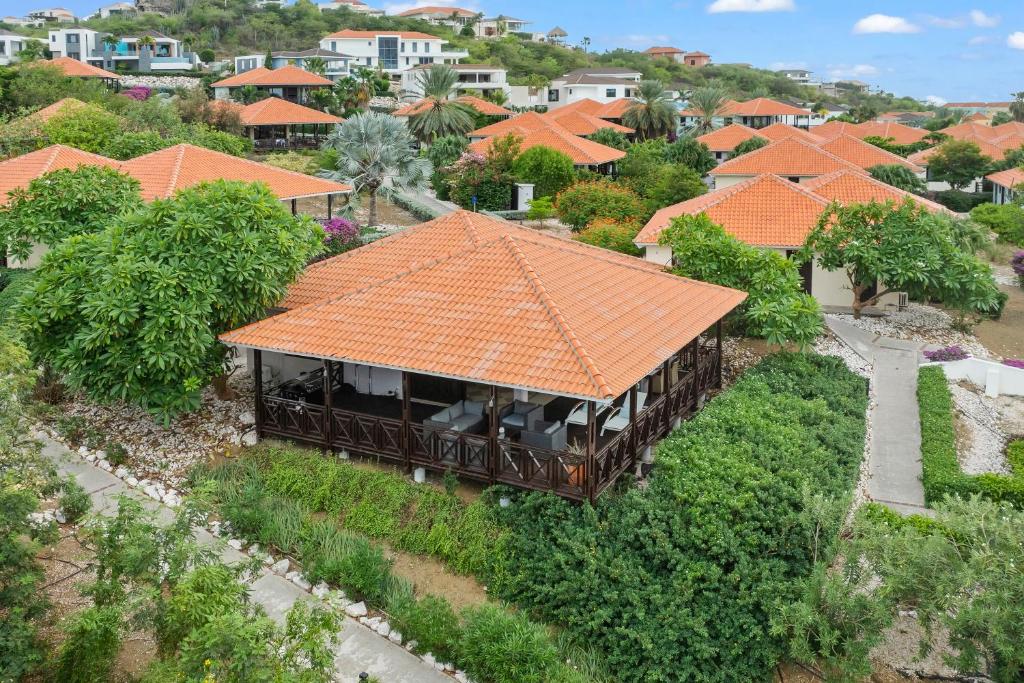 an overhead view of a house with an orange roof at Luxury Villas with Panoramic View in Blue Bay in Blue Bay