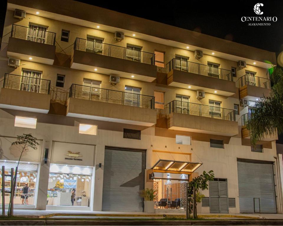 an apartment building with two balconies on top of it at ALOJAMIENTO CENTENARIO in Corrientes