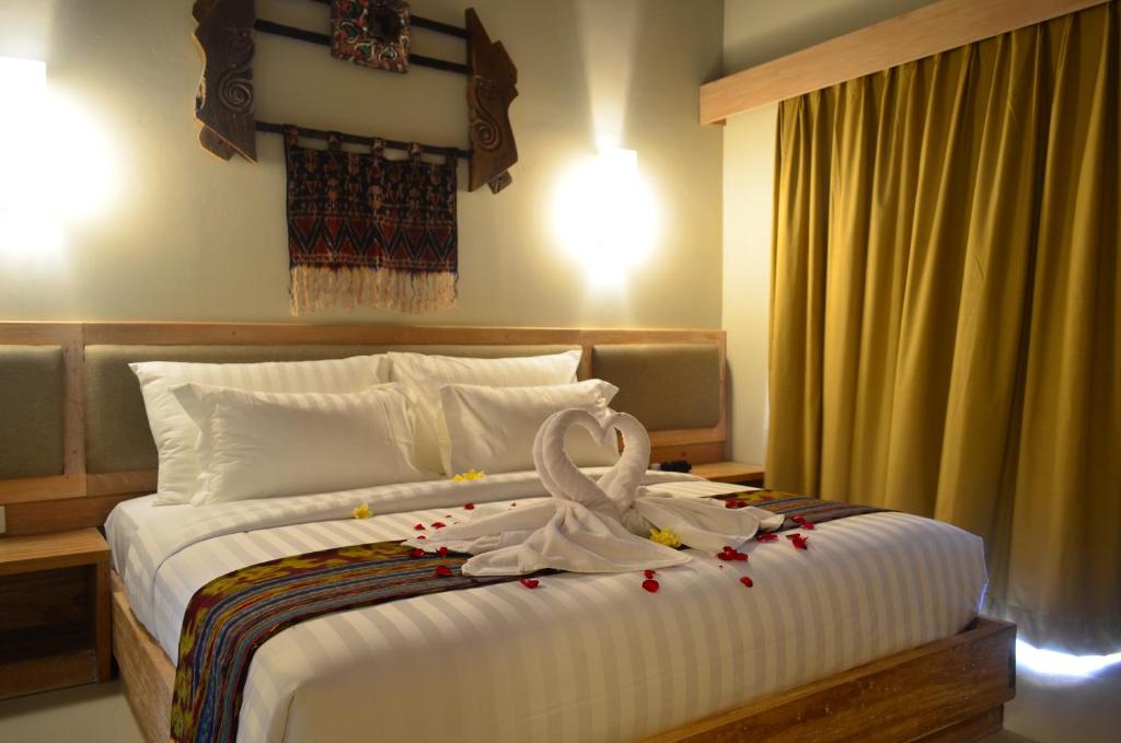 Postel nebo postele na pokoji v ubytování Tetirah Boutique Hotel