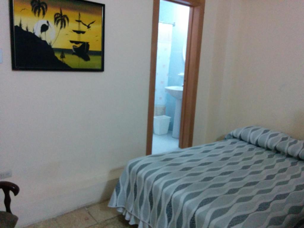 Postel nebo postele na pokoji v ubytování Hotel Mileto