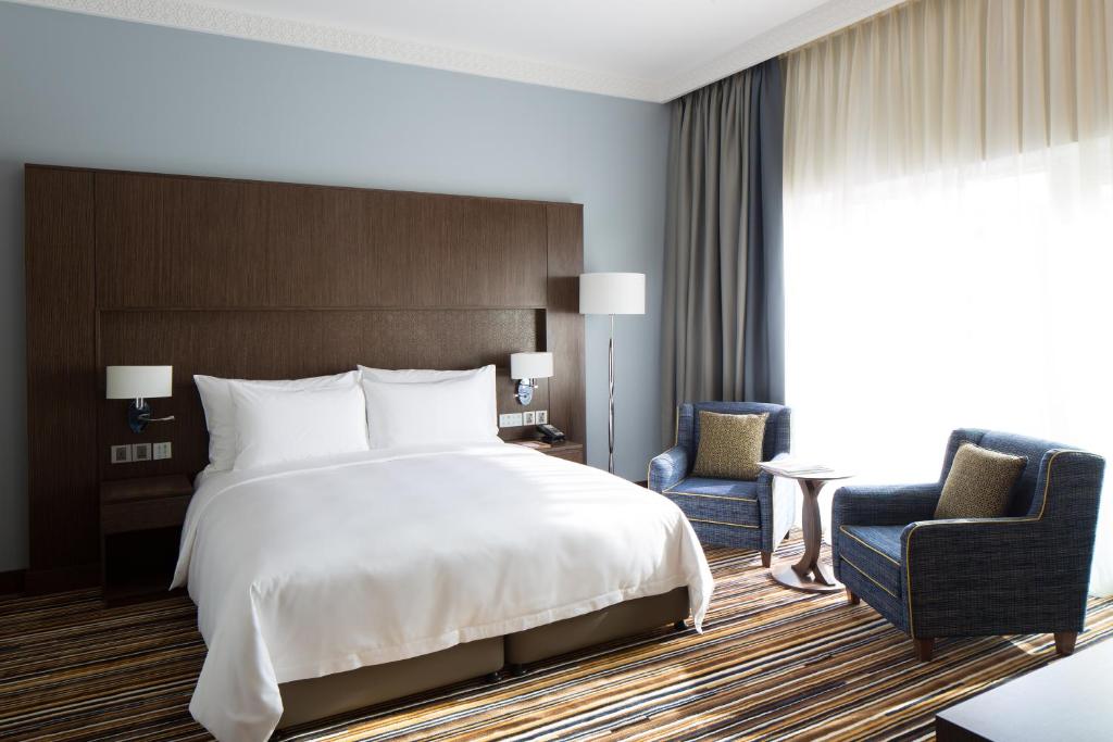 Postel nebo postele na pokoji v ubytování Dusit D2 Kenz Hotel Dubai