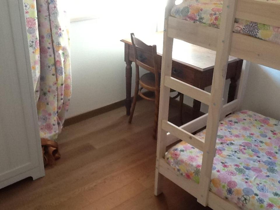 Łóżko lub łóżka w pokoju w obiekcie Villa Susina Casa Vacanze