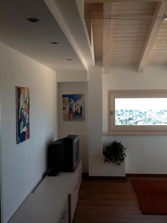 Telewizja i/lub zestaw kina domowego w obiekcie Villa Susina Casa Vacanze
