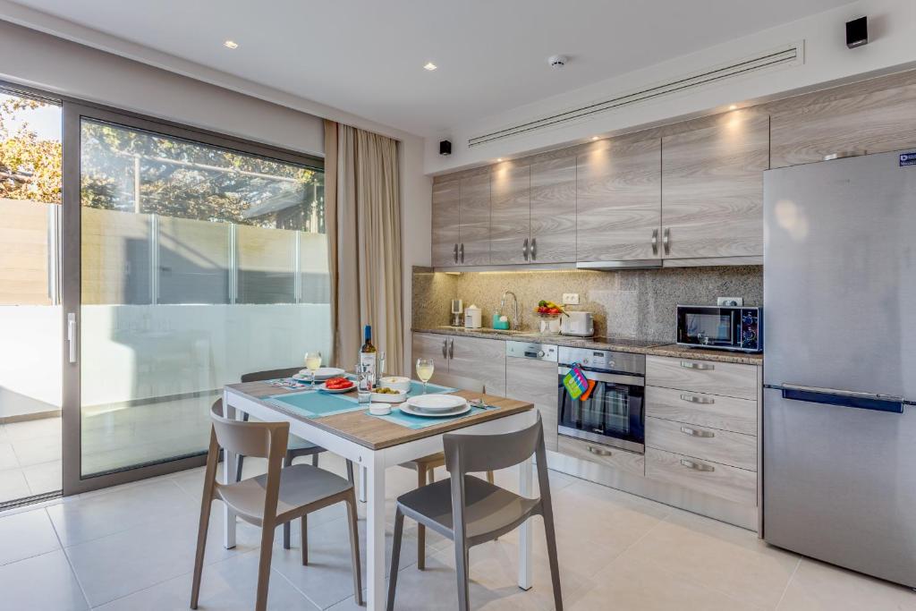 Kuchyň nebo kuchyňský kout v ubytování Angels Suites