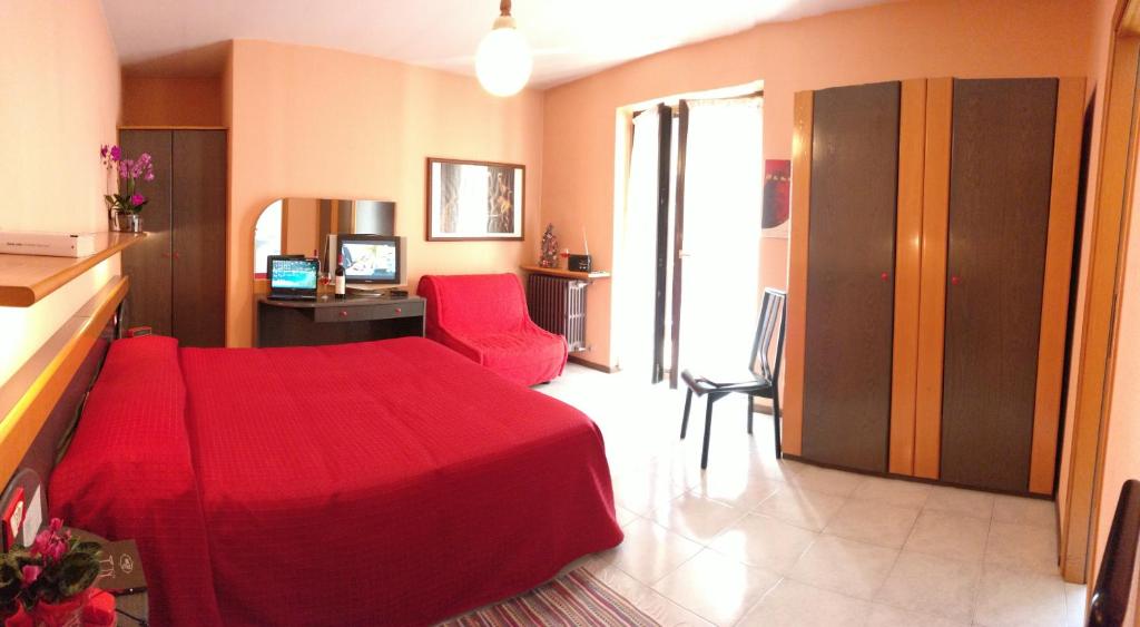 Postel nebo postele na pokoji v ubytování Hotel La Lanterna