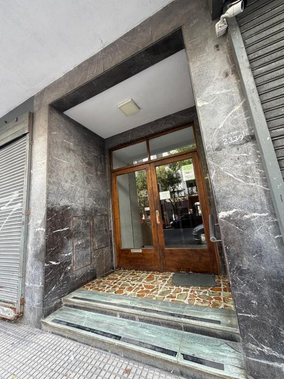 a front door of a building with a glass at Zona centro #N in Mar del Plata