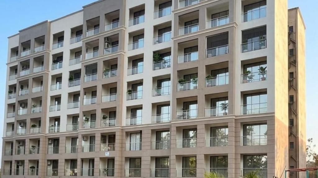 an external view of a building at Motus Mountain view Hotels in Jambhulpāda