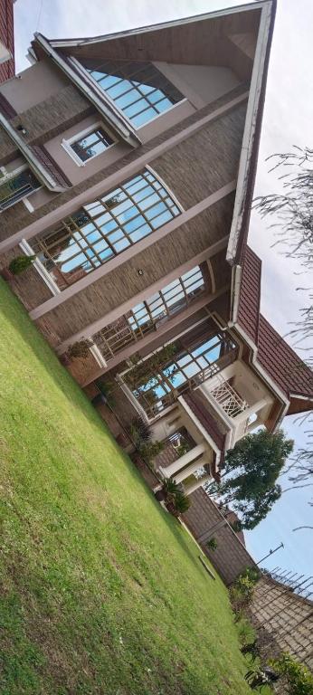 a building with many windows on the side of it at Acacia Boutique in Eldoret