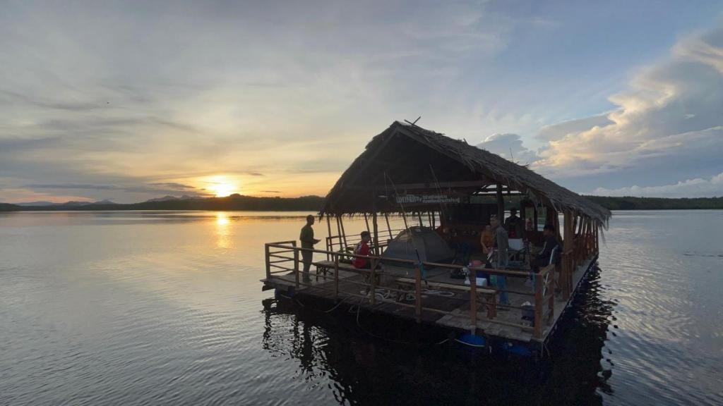 a group of people on a boat in the water at Krabi Floating Glamping in Ban Khlong Khae (2)
