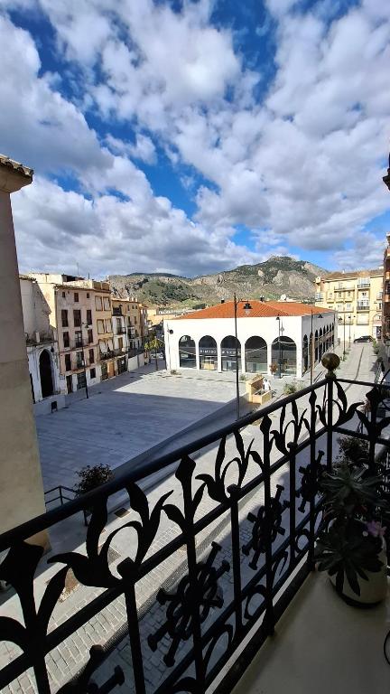 a view of a city from a balcony at Casa Antik in Loja
