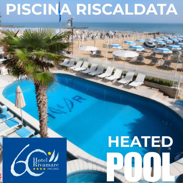 a picture of a heated pool at a resort at Hotel Rivamare in Lido di Jesolo