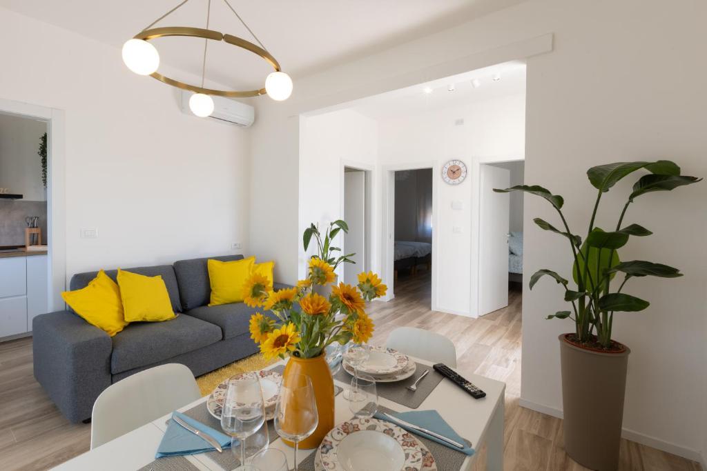 a living room with a couch and a table at Gradisca Go Home 2 in Gradisca dʼIsonzo