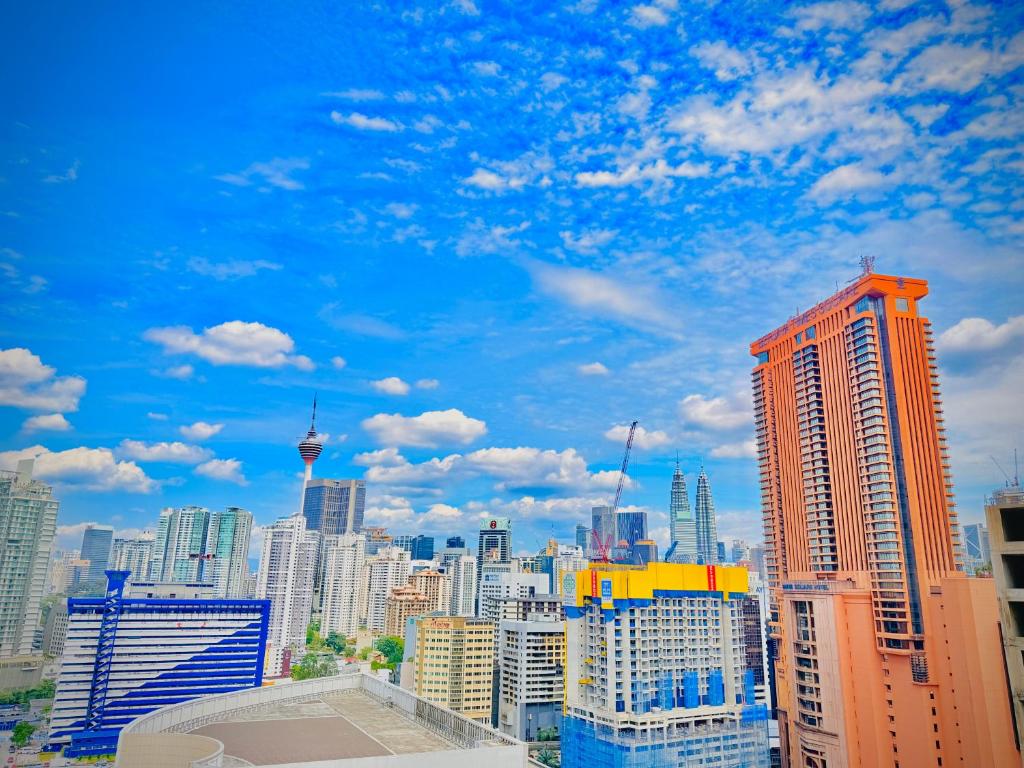 a view of a city skyline with buildings at Lucentia residence luxury suites in Kuala Lumpur