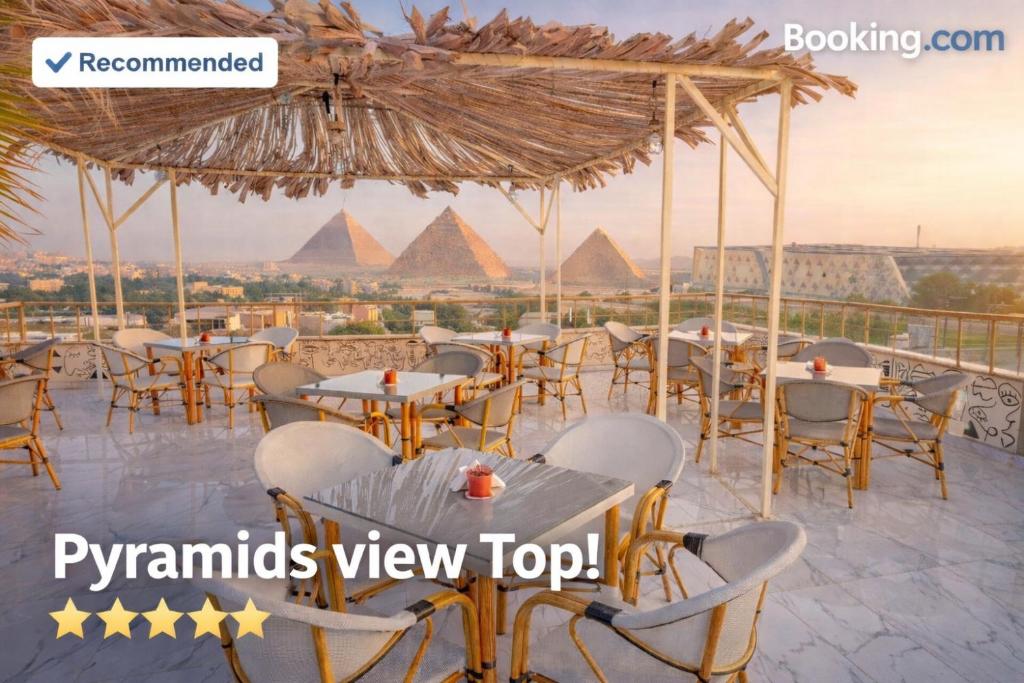 a view of the pyramids from the roof of a restaurant at pyramids View Top in Cairo