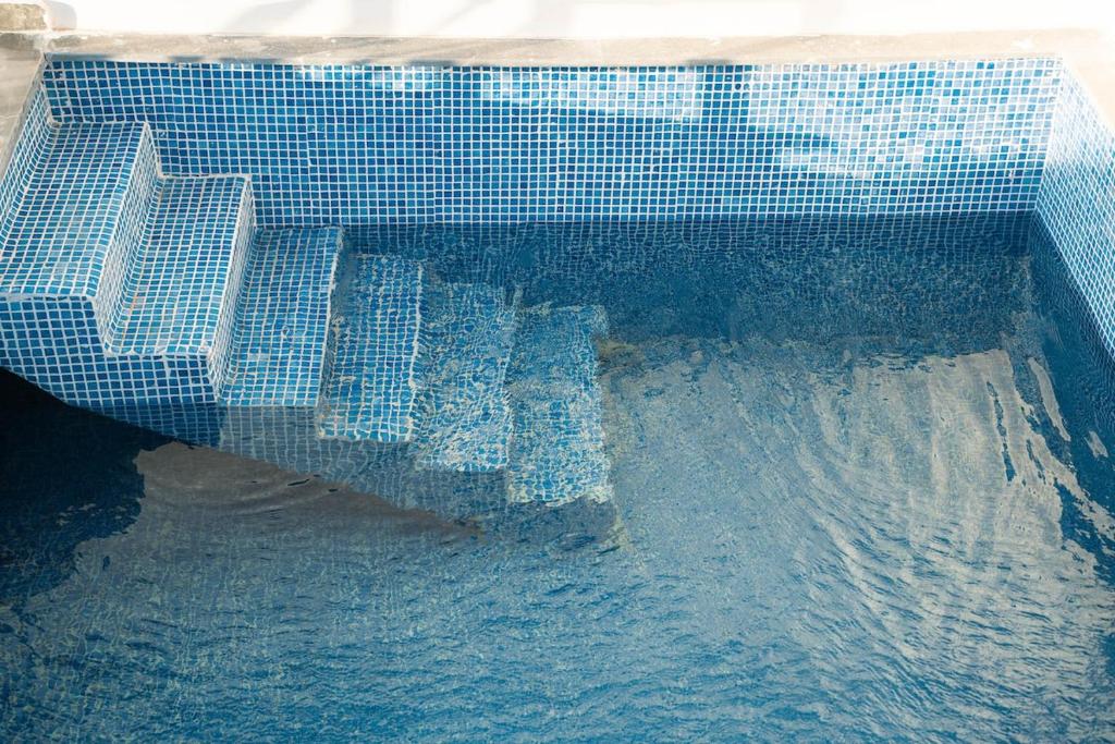 a pool of water with some buildings in it at Villa America Dakhla in Dakhla