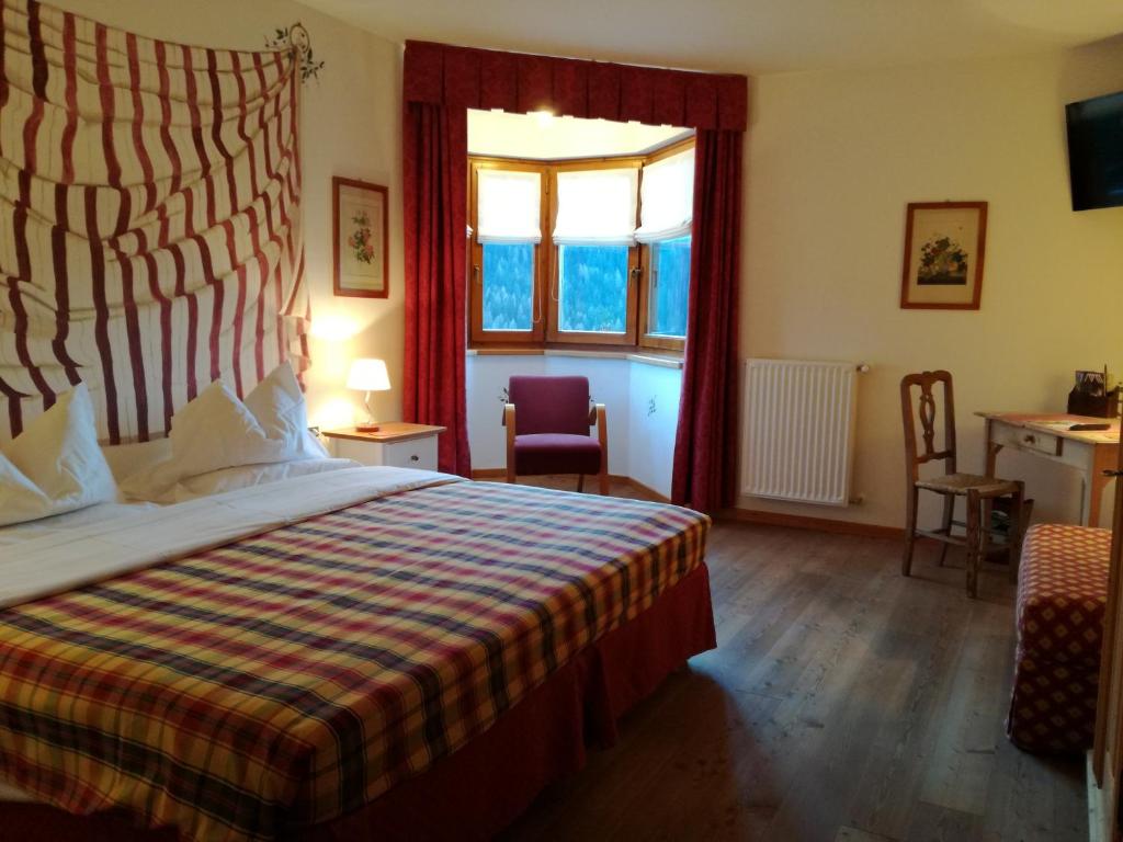 Postel nebo postele na pokoji v ubytování Hotel Ca' del Bosco