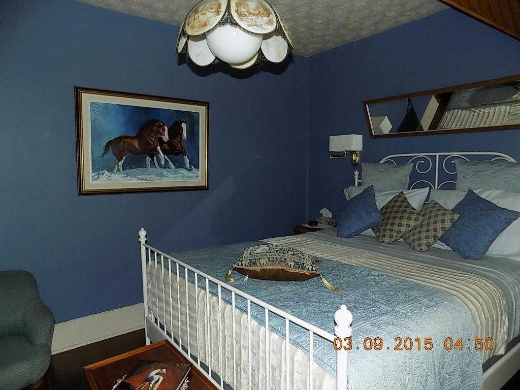 Postel nebo postele na pokoji v ubytování À L'Ancestrale B&B