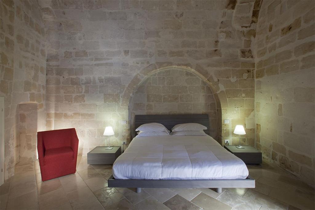 Postel nebo postele na pokoji v ubytování Antico Convicino Rooms Suites & SPA