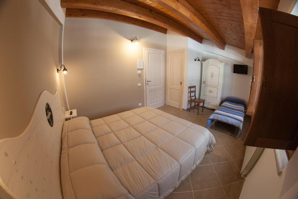 Postel nebo postele na pokoji v ubytování Il Vicoletto B&B