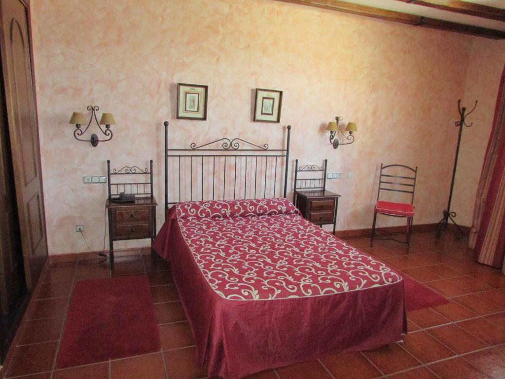 Postel nebo postele na pokoji v ubytování Hotel Real Castillo