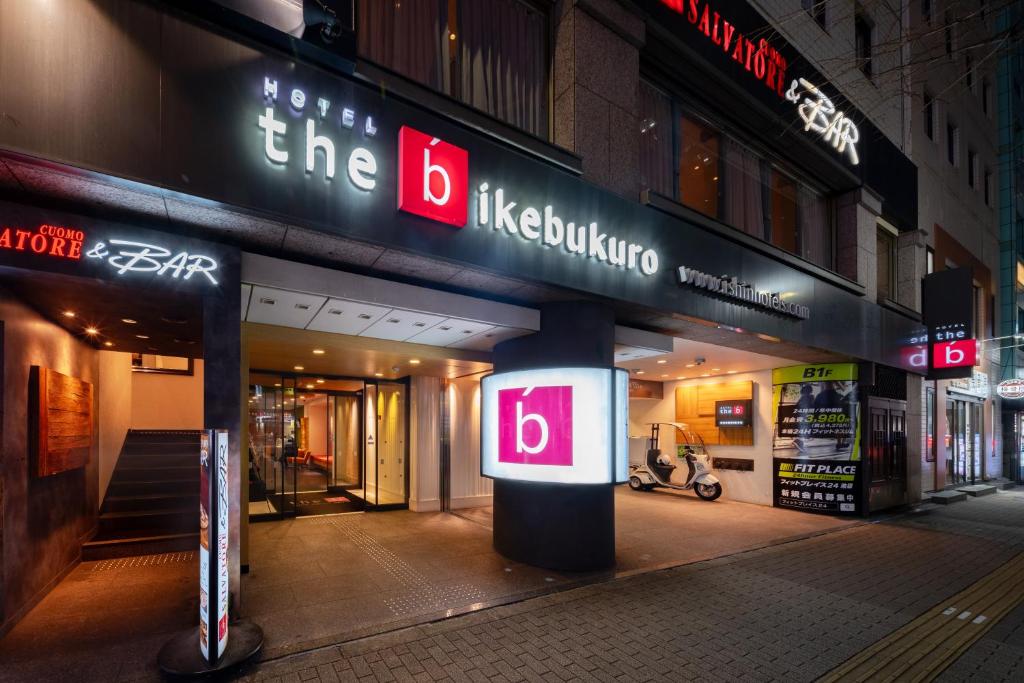 a building with a sign on the side of it at the b ikebukuro in Tokyo