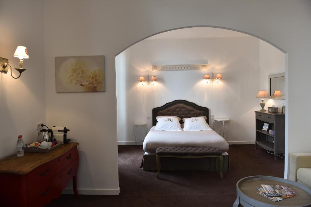 Katil atau katil-katil dalam bilik di Villa des Glycines
