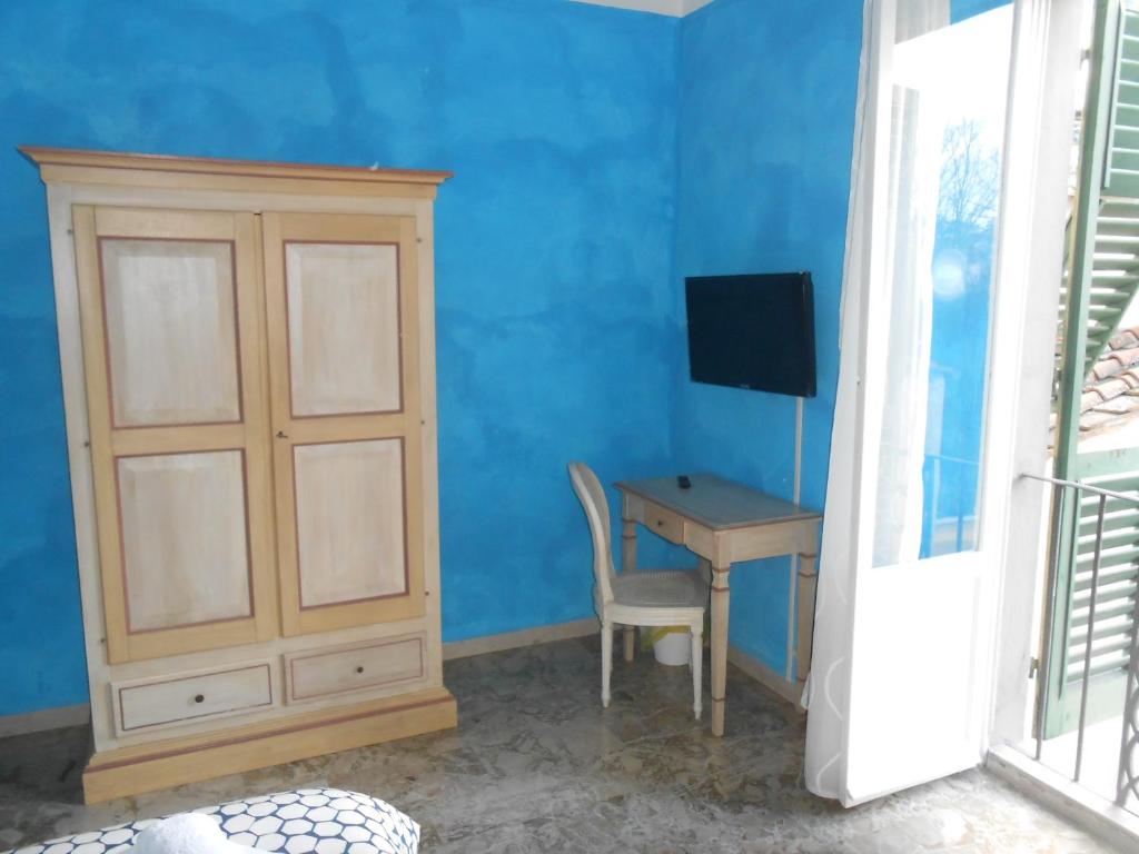 Televízia a/alebo spoločenská miestnosť v ubytovaní Scala Apartment