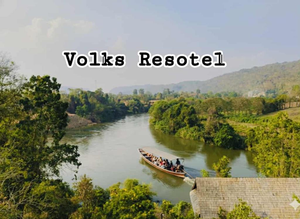 a group of people in a boat on a river at Volk resotel in Ban Nong Chaeng