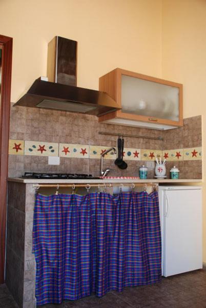 Kuchyň nebo kuchyňský kout v ubytování Terrauzza Sul Mare di Renata Emmolo