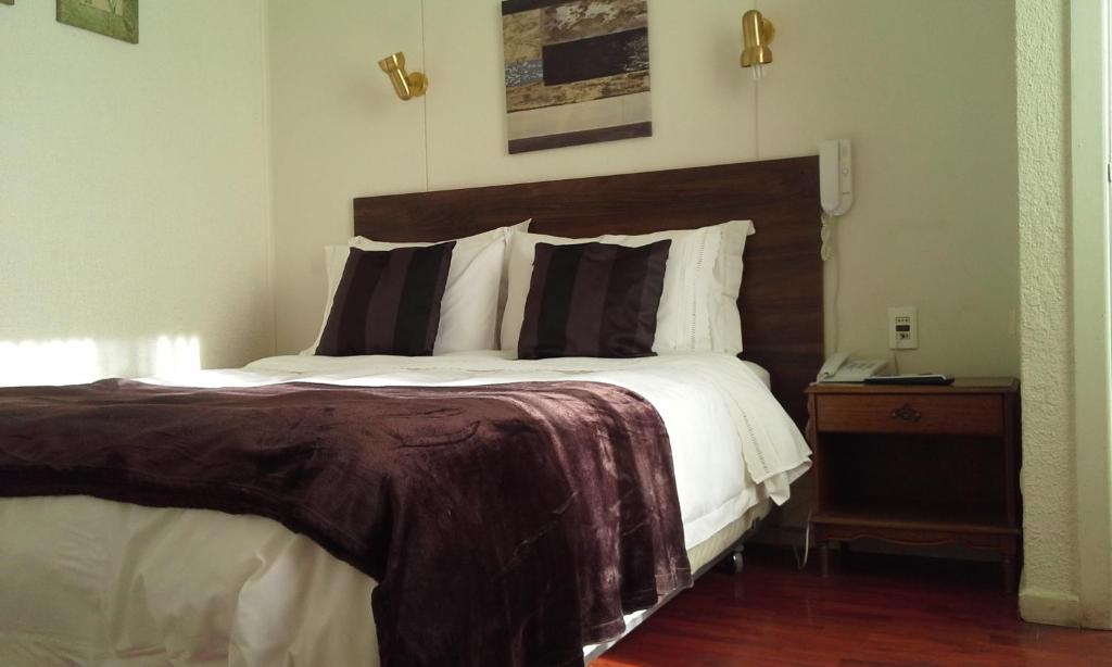 Postel nebo postele na pokoji v ubytování Matic Apartments