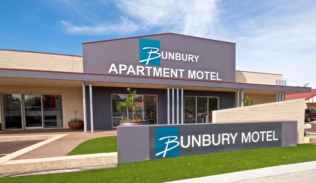 a building with a sign in front of it at Bunbury Motel and Apartments in Bunbury