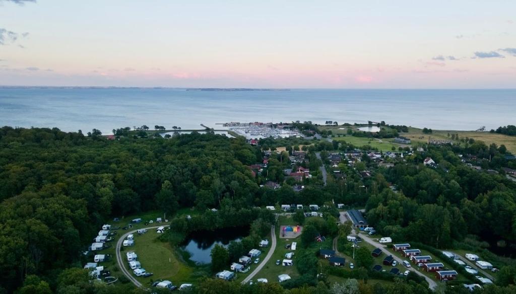 an aerial view of a parking lot next to the water at Nivå Camping & Glamping in Nivå