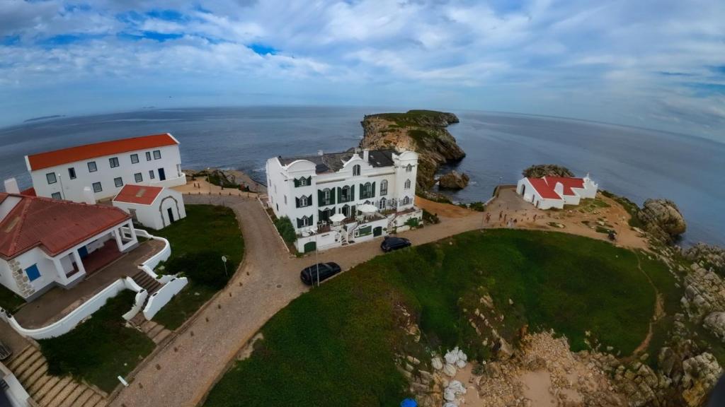 an aerial view of a house on an island in the ocean at Casa das Marés 3 in Baleal