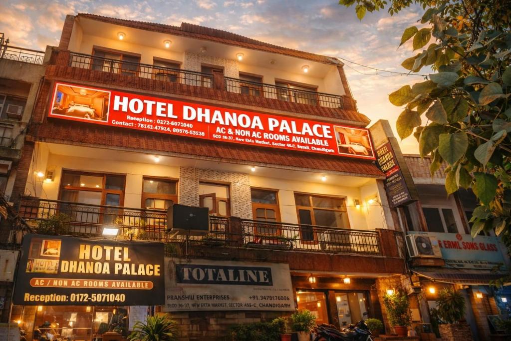 a hotel with signs on the side of a building at HOTEL DHANUA PALACE in Chandīgarh