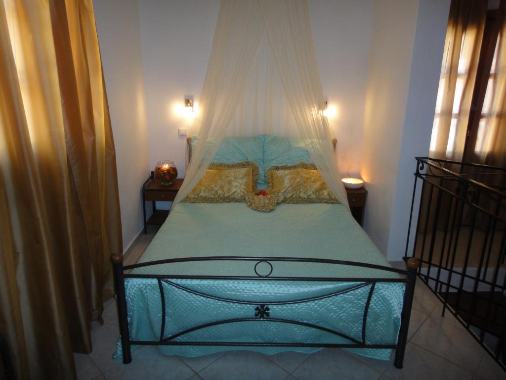 Postel nebo postele na pokoji v ubytování Captain's Suites